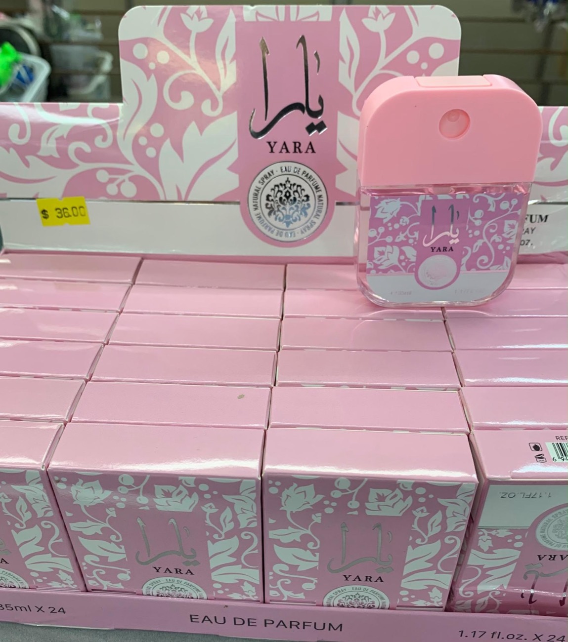 Pink perfume bottles in a display