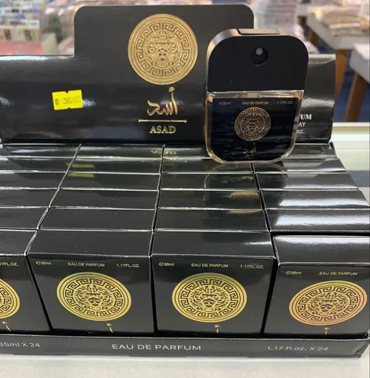 Black & gold eau de parfum · Perfume negro y dorado