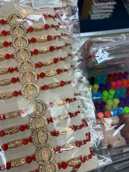Guadalupe medal bracelets · Pulseras con medallas de la Virgen de Guadalupe