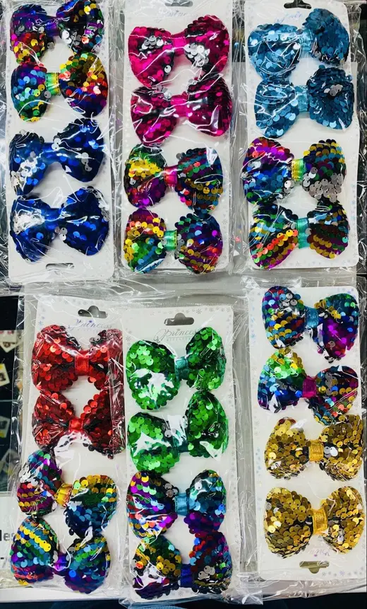 Sequin bows · Moños de lentejuela